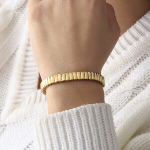 BRAZALETE . FIGURAS EN BAÑO DE ORO