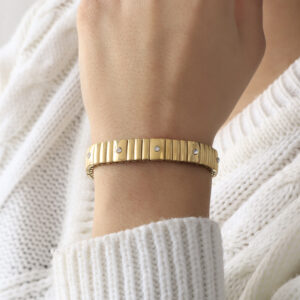 BRAZALETE . FIGURAS EN BAÑO DE ORO