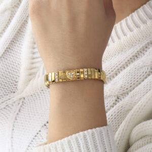 BRAZALETE . FIGURAS EN BAÑO DE ORO