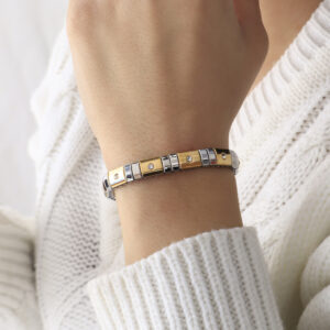 BRAZALETE . C/MOSTACILLA EN BAÑO DE ORO