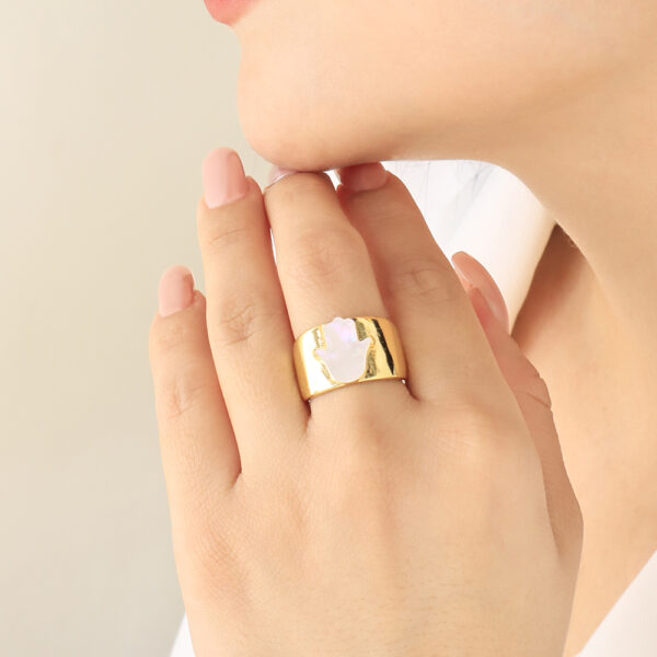 ANILLO . CRISTAL-PERLA EN BANO DE ORO
