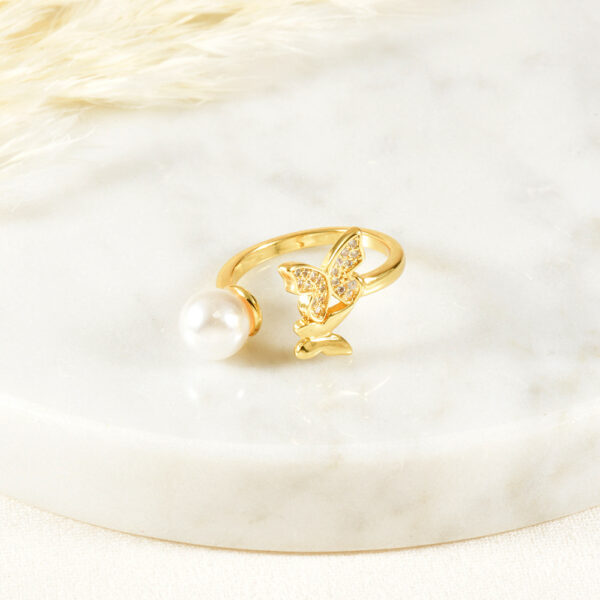 ANILLO . C/FLORES EN BAÑO DE ORO