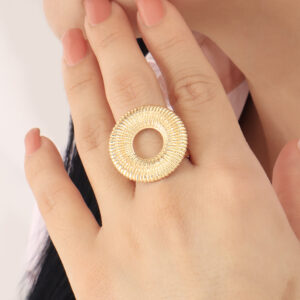 ANILLO . ARETE EN BAÑO DE ORO