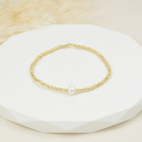 PULSERA . C/ PERLAS EN BAÑO DE ORO