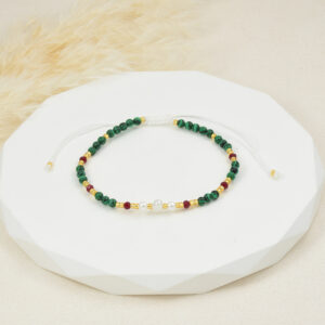 PULSERA . C/PERLA Y PIEDRAS EN BAÑO DE ORO
