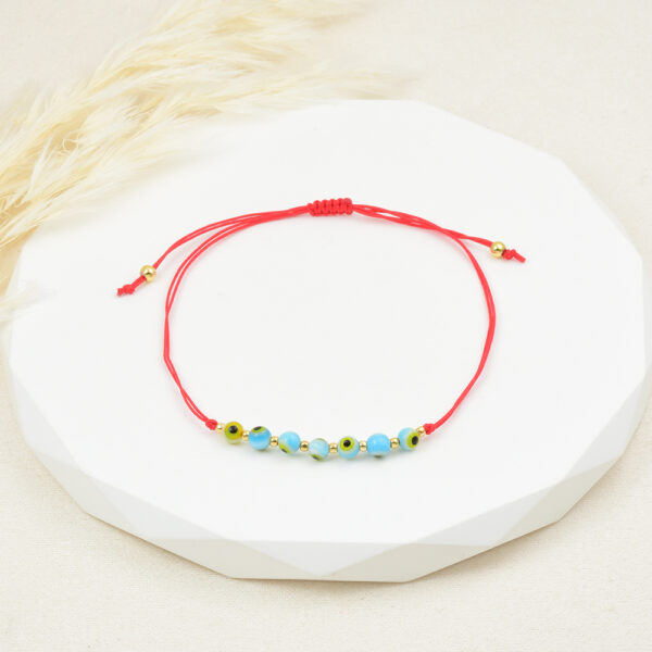 PULSERA . FLAUTAS METALICAS EN BAÑO DE ORO
