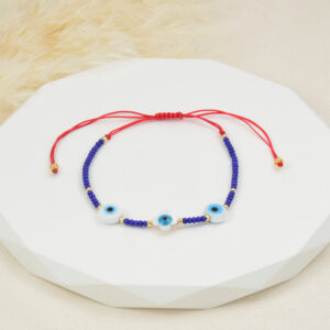 PULSERA . FLAUTAS METALICAS EN BAÑO DE ORO