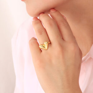 ANILLO . FIGURAS EN BAÑO DE ORO