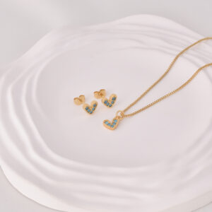 JUEGOS  C/ PIEDRAS EN BAÑO DE ORO