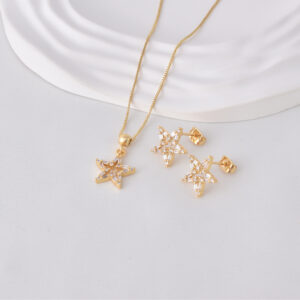 JUEGOS  C/ PIEDRAS EN BAÑO DE ORO