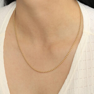 CADENA . C/CRISTAL- BALIN EN ORO LAMINADO