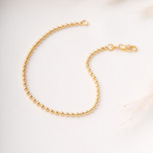 PULSERA . C/CRISTAL- BALIN EN ORO LAMINADO