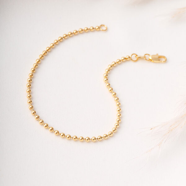 PULSERA . C/CRISTAL- BALIN EN ORO LAMINADO
