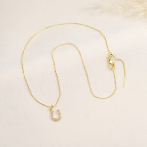 GARGANTILLA C/ DIJES EN BAÑO DE ORO