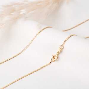 CADENA . C/BOLA DE FUEGO Y BALIN EN ORO LAMINADO