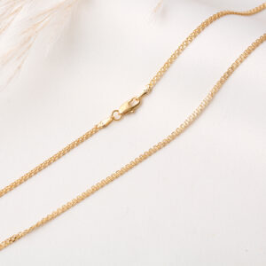 CADENA . LONG CURB EN ORO LAMINADO