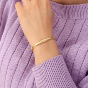 BRAZALETE . FIGURAS EN BAÑO DE ORO